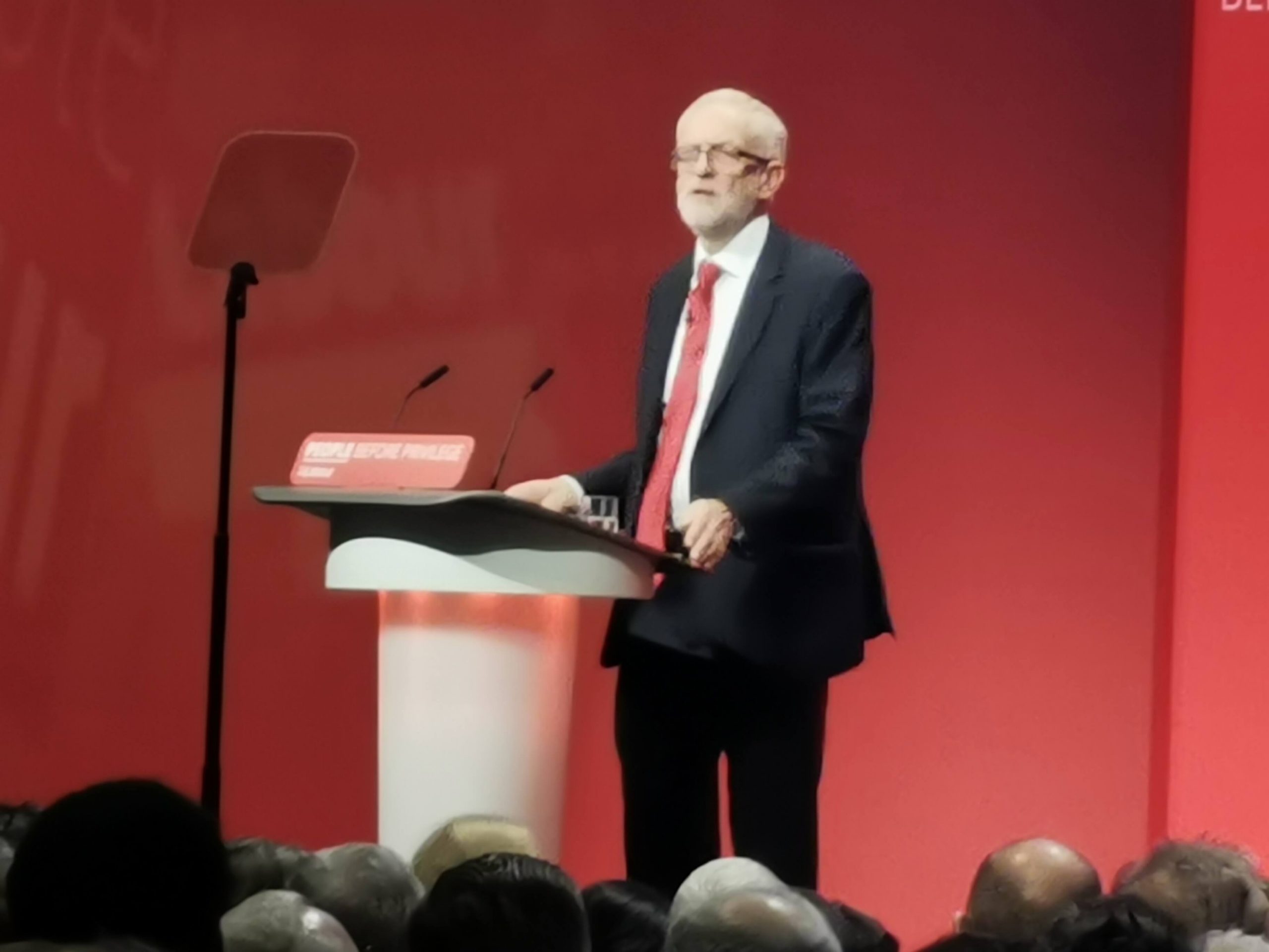 Jeremy Corbyn standing giving his final speech at the Labour Conference in Brighton in 2019.